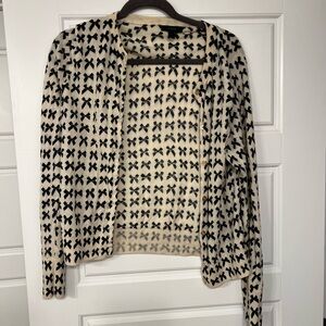 Jcrew black and cream bow pattern wool cardigan size large. Small hole